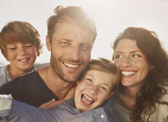 Family Portrait of family outdoors, close up